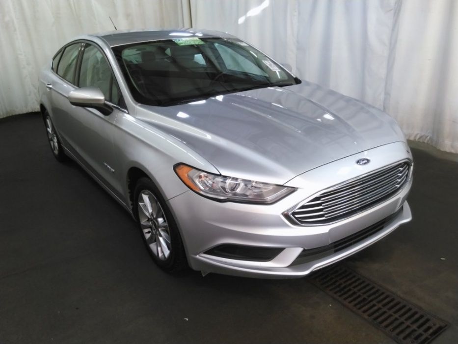 Удивительный гибрид за 9800$ - FORD TITANIUM!