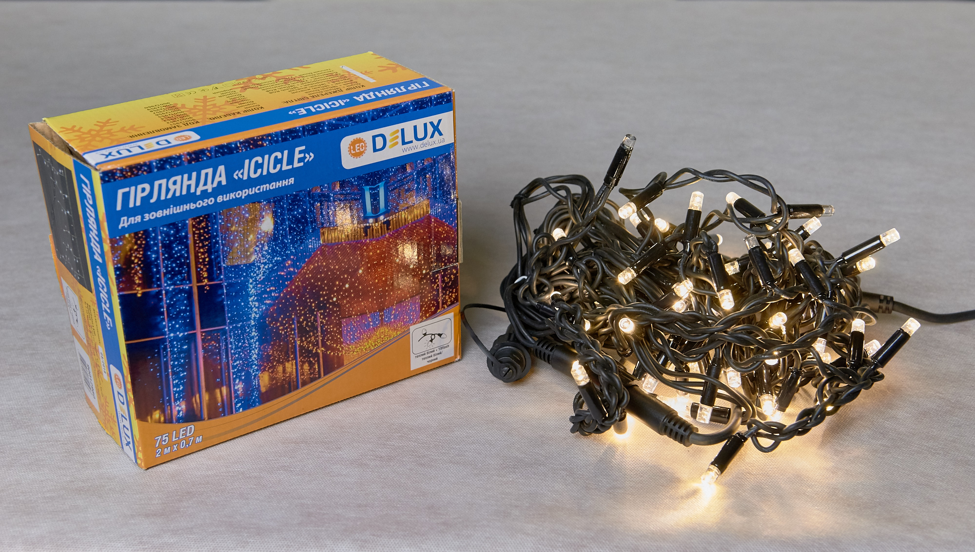 Гірлянда зовнішня DELUX ICICLE 75 LED бахрома 2x0,7m 18 flash теплий білий/чорний IP44 EN